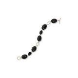 14K Yellow Gold Onyx Oval Twist Lentil Bracelet photo